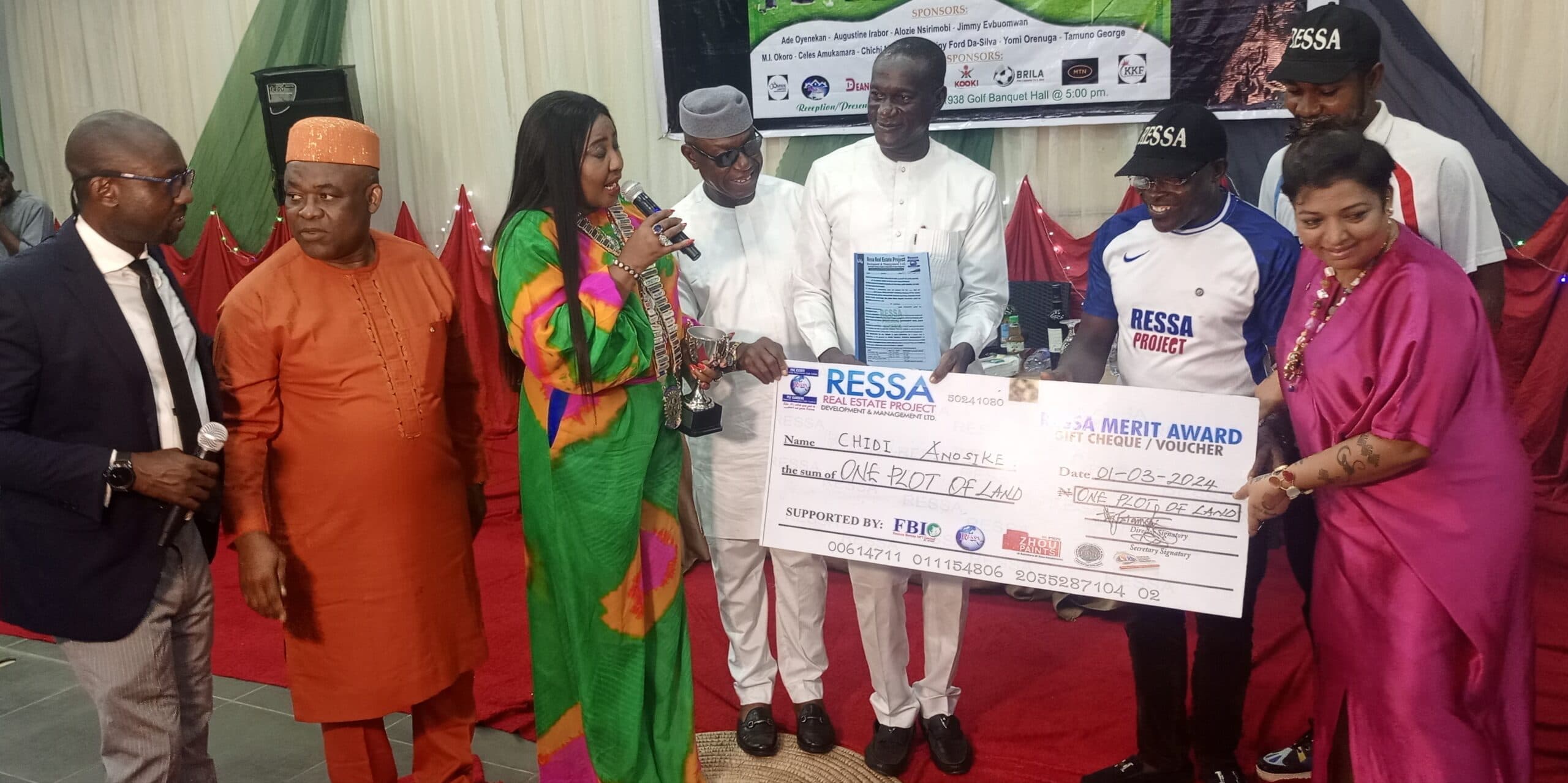 Handing over deeds — one plot of land at a time